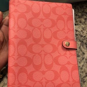 NWT Coach notebook